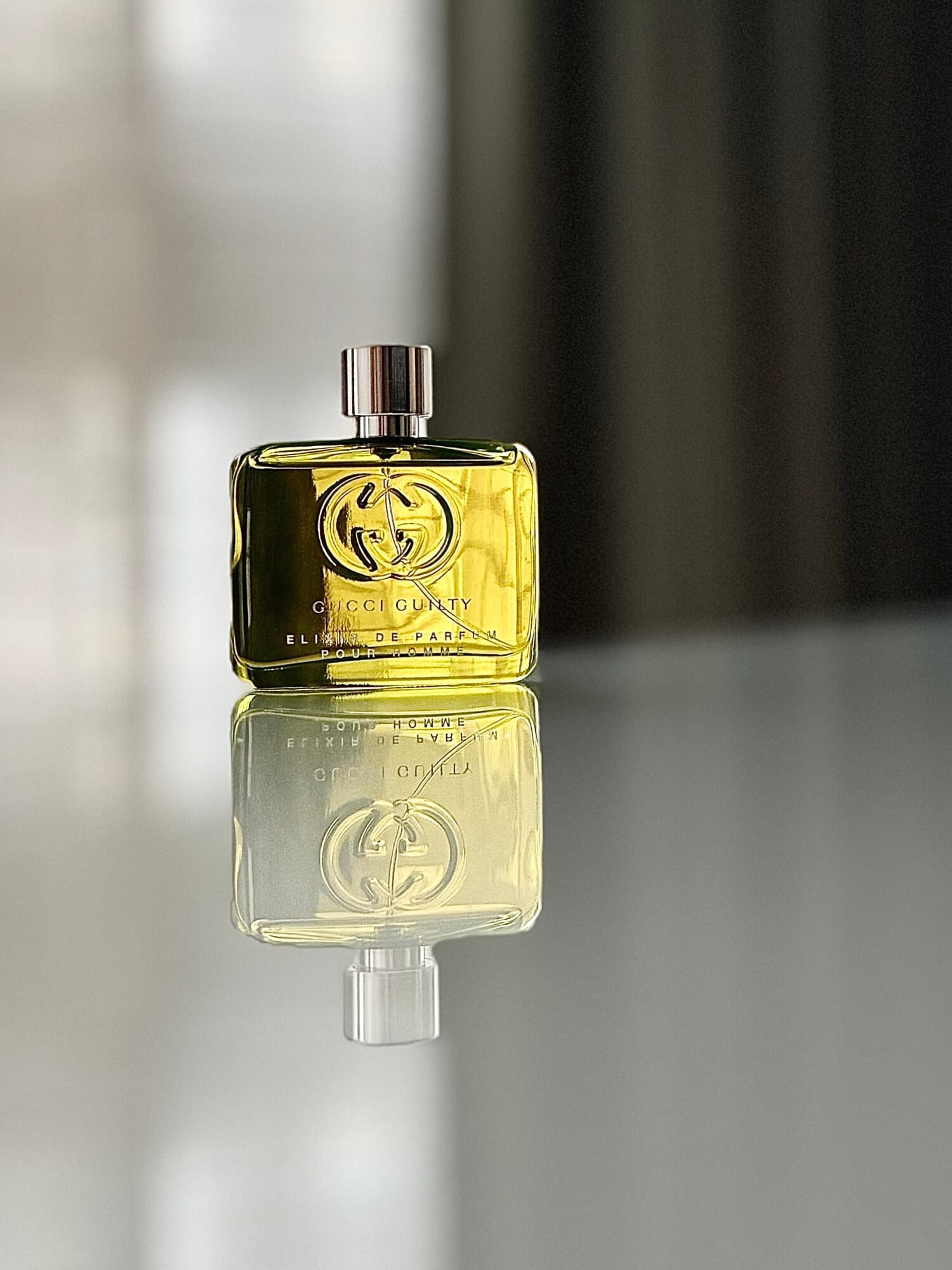 Guilty Elixir de Parfum pour Homme, bottle, angle