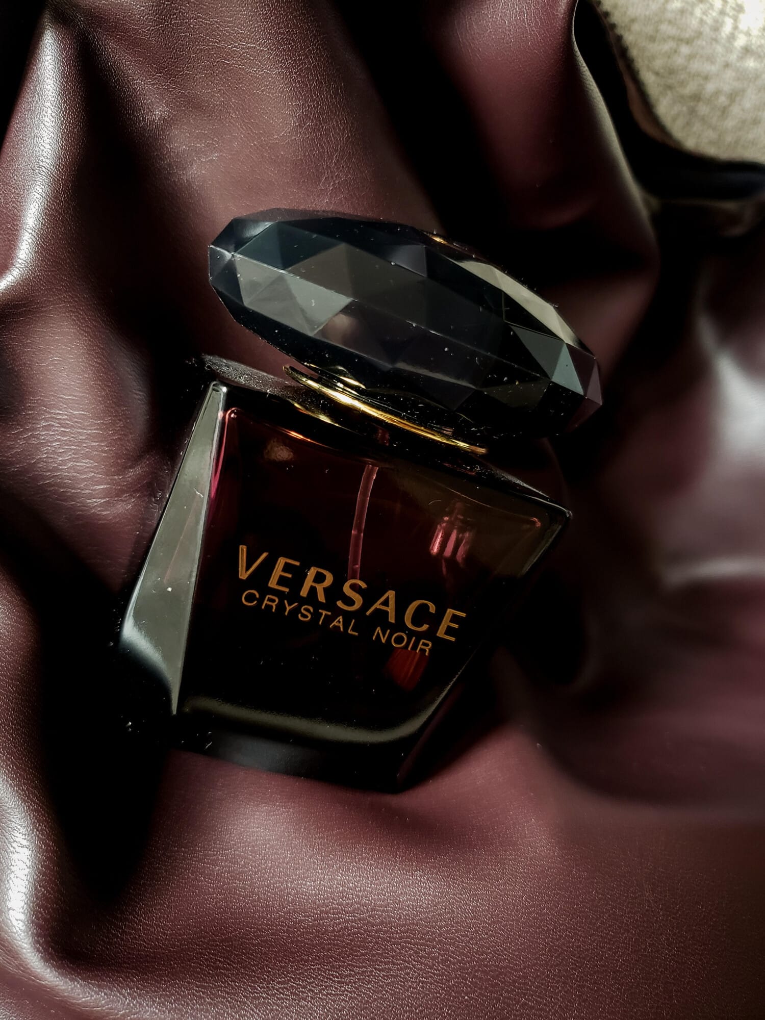 Crystal Noir Parfum, bottle, angle