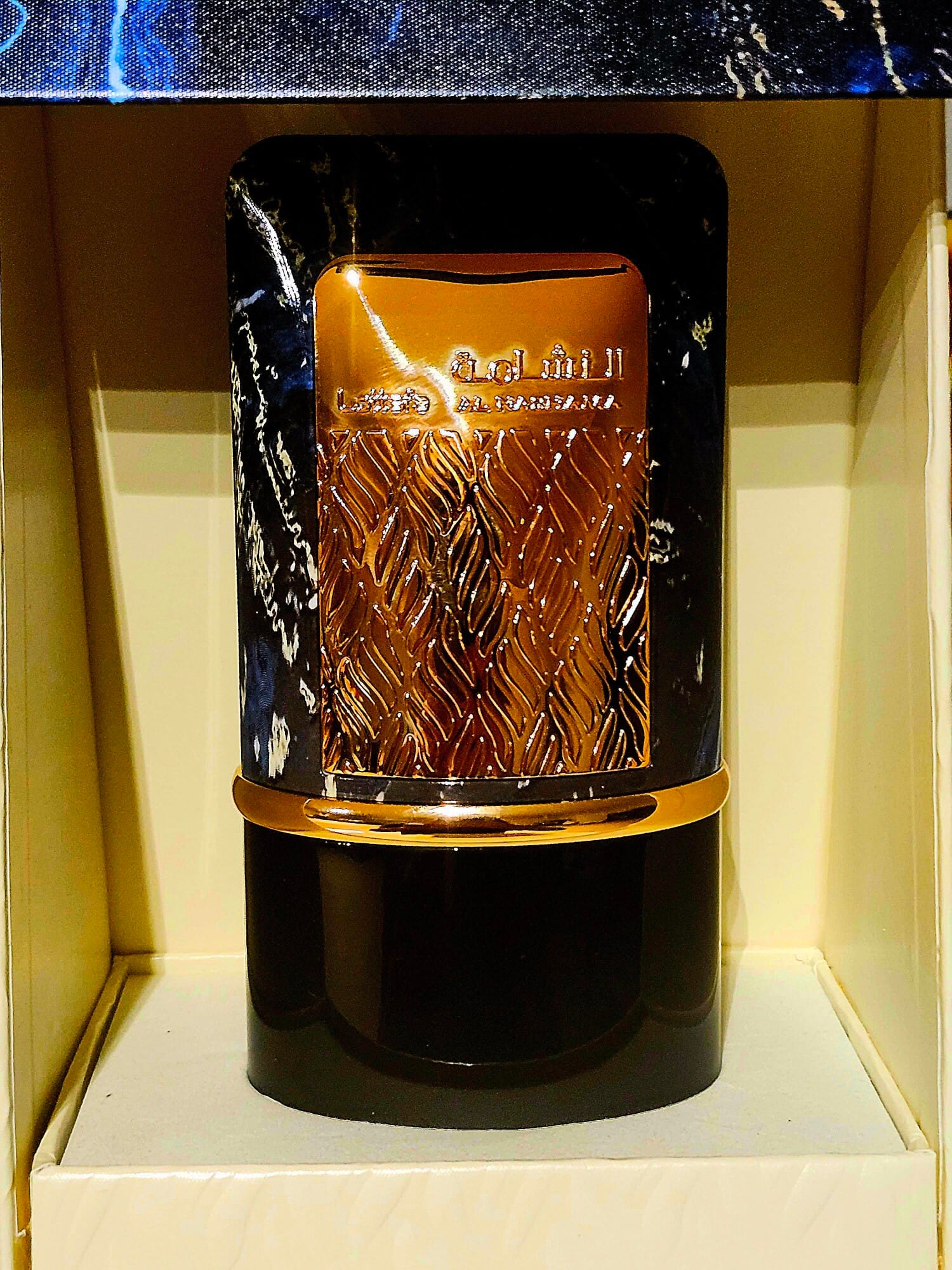 Al Nashama Caprice, bottle, angle